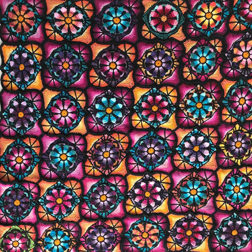 This Stained Glass Flowers Blanket Is Perfect For Curling Up With A