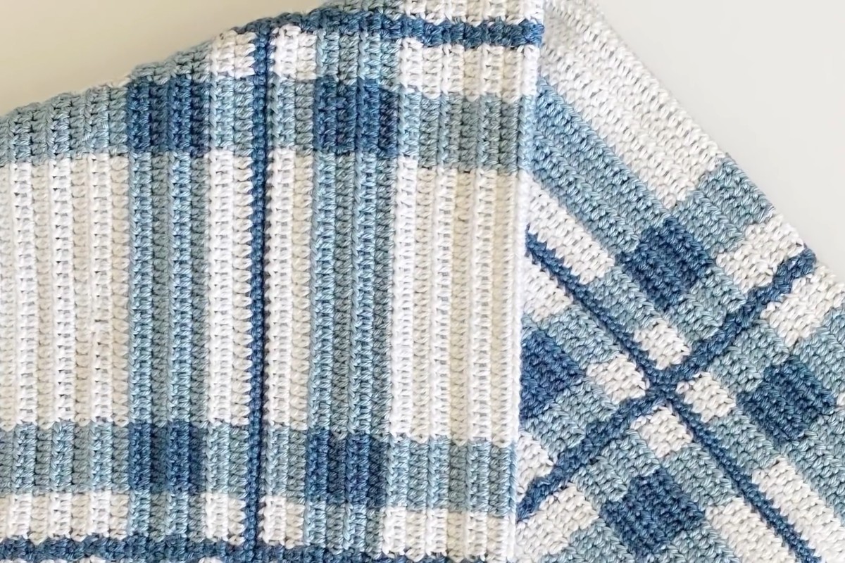 Crochet blue plaid baby blanket in white, light blue and dark blue by Daisy Farm Crafts