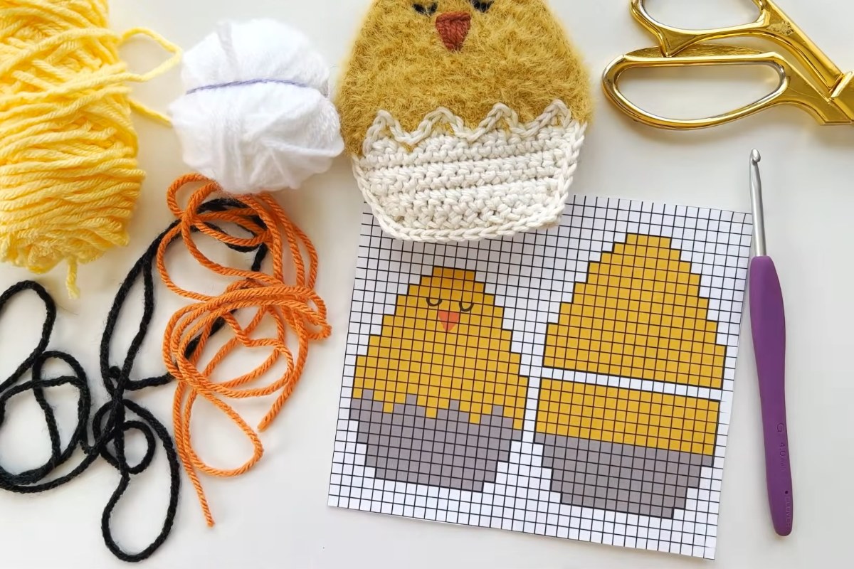 Yellow, white, orange and black worsted yarn with a G hook and the color chart for the crochet chick egg