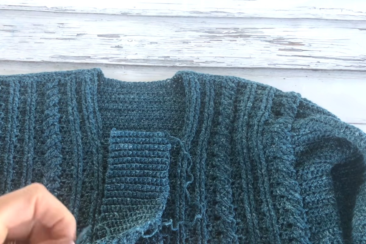 Collar of the Dapper Dad men's cabled crochet pullover by MJ's Off The Hook Designs