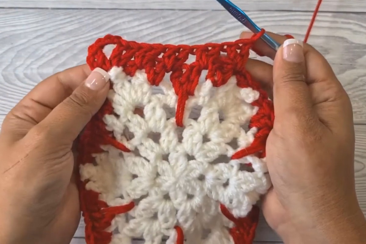 Crochet granny snowflake hexagon with red outer round by Crafting Happiness