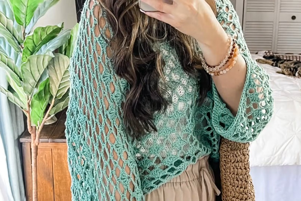 Finished In Bloom Lace Pullover worn over a tank top with relaxed sleeves