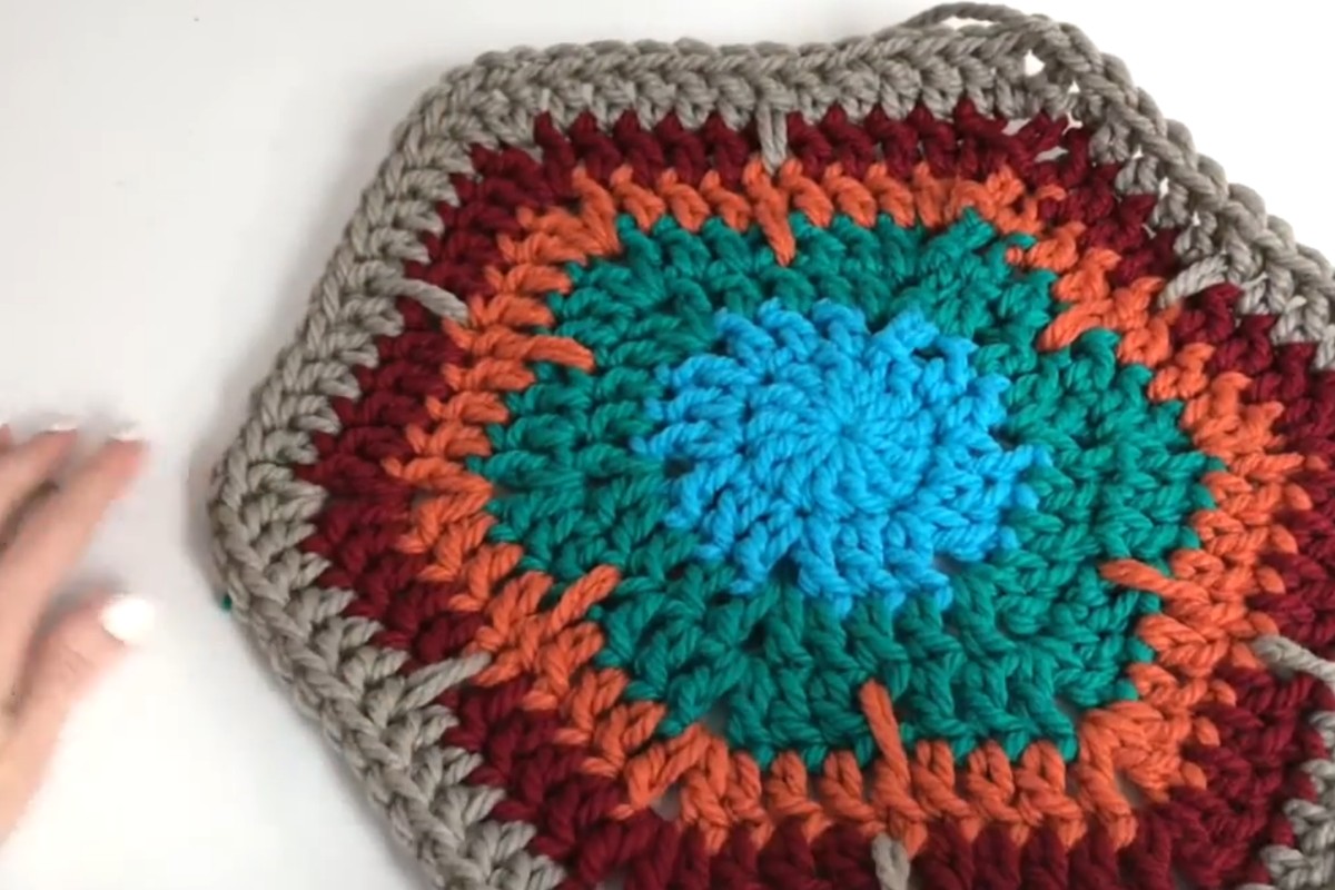 Large bulky crochet hexagon in five colors with spike stitches by MJ's Off The Hook Designs