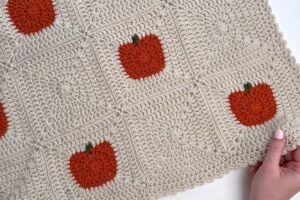 Pumpkin patch granny square blanket with a picot edge by MJ's Off The Hook Designs