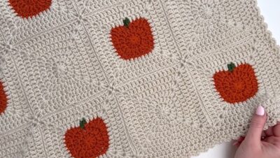 Pumpkin patch granny square blanket with a picot edge by MJ's Off The Hook Designs