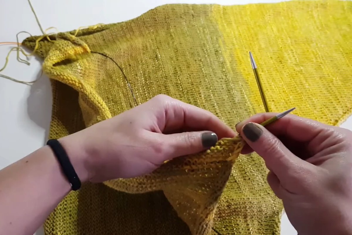 Knitting the body of the Sunshine Sweater in stockinette stitch on circular needles